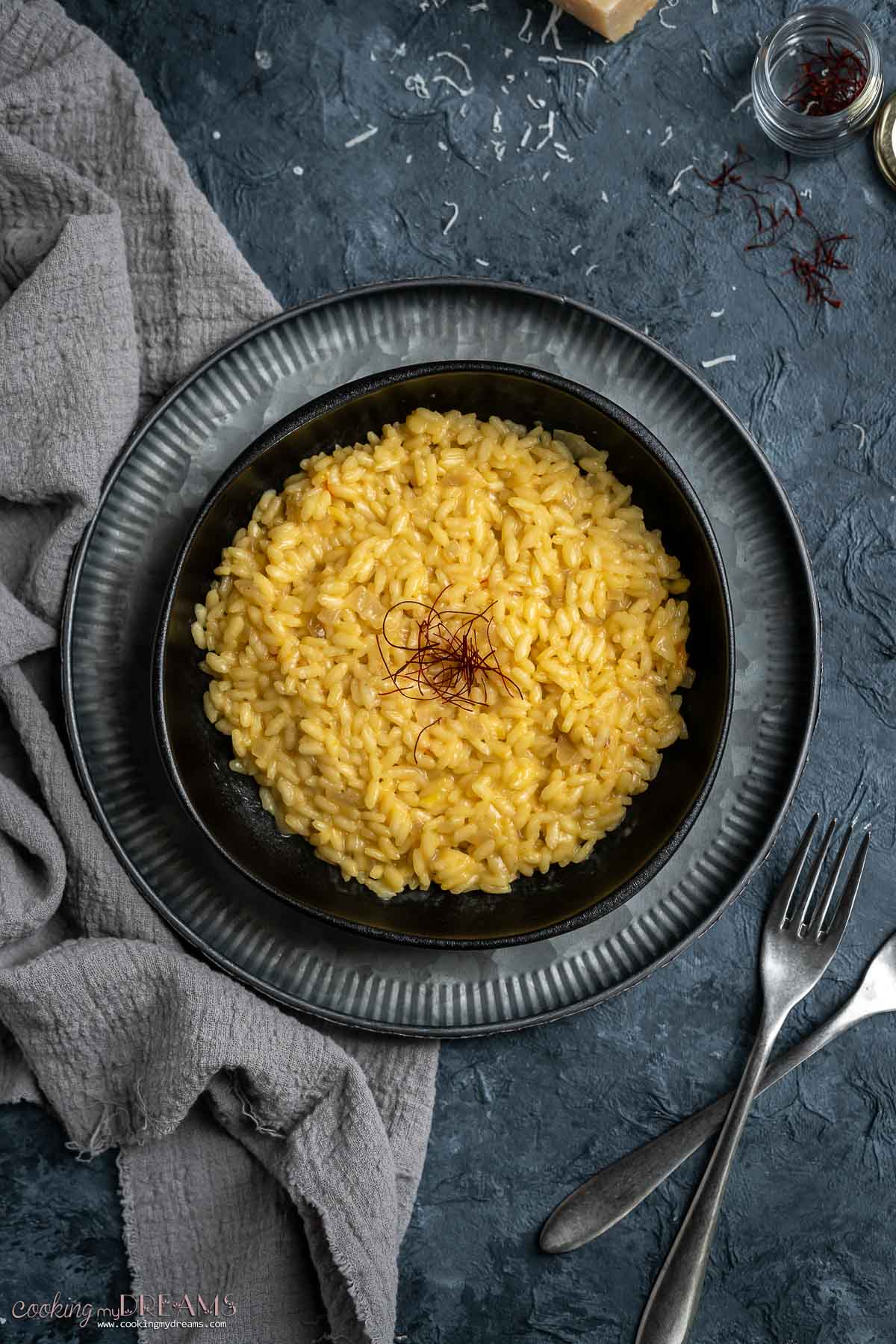 overhead of saffron risotto in a plate