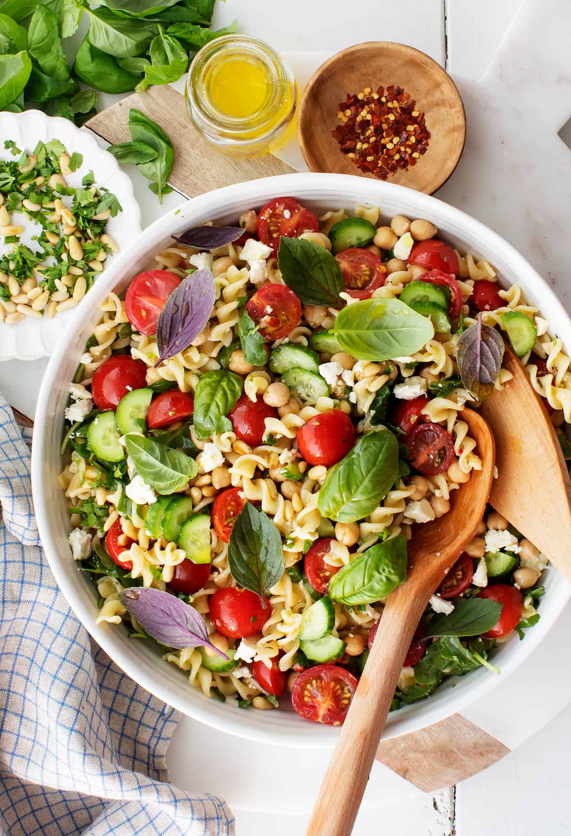 Pasta salad with cherry tomatoes, cucumbers, and feta