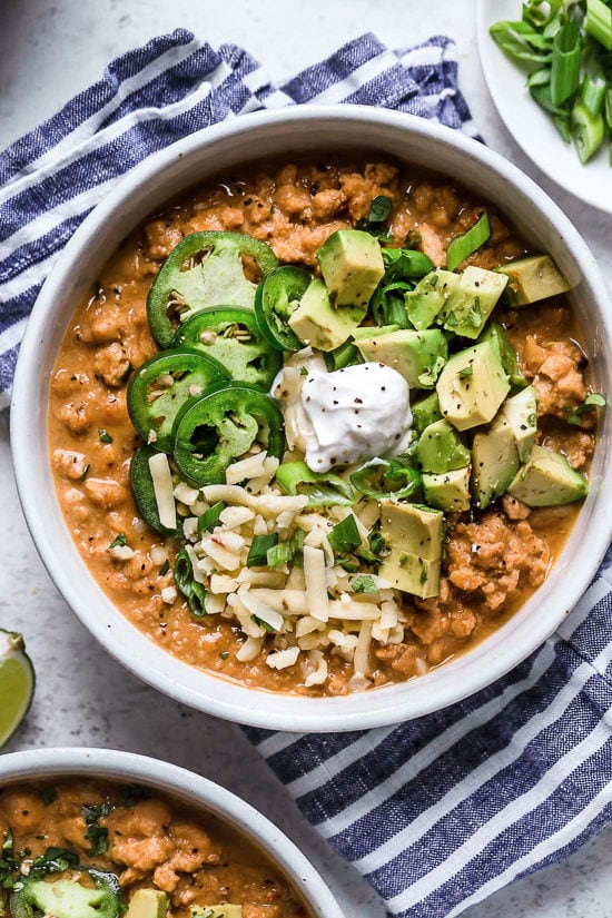A delicious, creamy White Bean Turkey Chili recipe made with canned white beans, ground turkey, aromatics and spices &ndash; no tomatoes!
